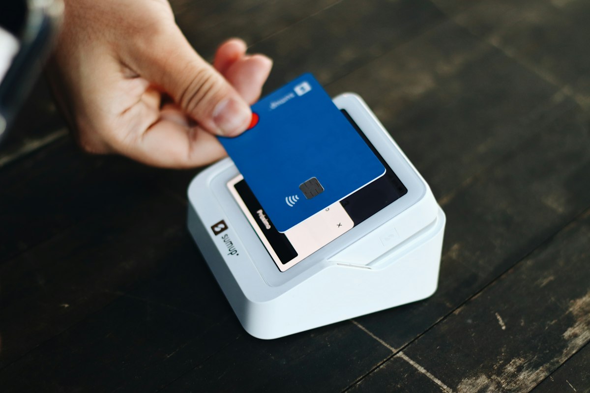 A card being tapped on a payment terminal