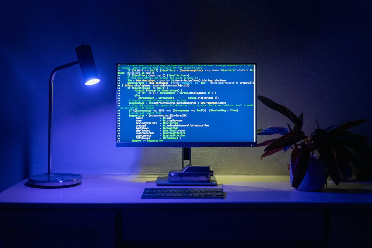 Code on a monitor in blue light