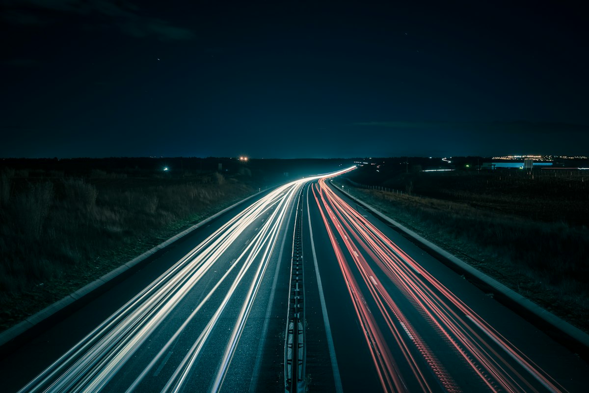 Light trails along a highway at night